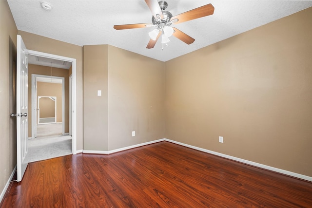 4838 Fair Oak Dale Ln, Humble, TX 77346 - unfurnished room featuring attic access, wood finished floors, a smoke detector, and ceiling fan
