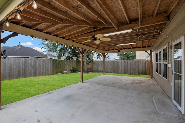 4838 Fair Oak Dale Ln, Humble, TX 77346 - fenced backyard with a patio area and ceiling fan