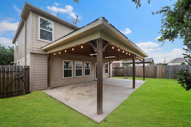 4838 Fair Oak Dale Ln, Humble, TX 77346 - fenced backyard with a patio and ceiling fan