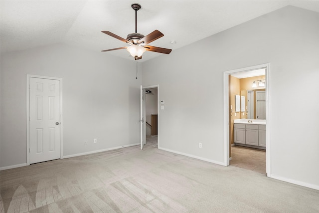 4838 Fair Oak Dale Ln, Humble, TX 77346 - unfurnished bedroom with vaulted ceiling, light colored carpet, ensuite bathroom, and ceiling fan