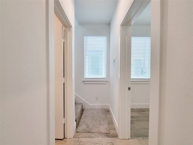 6735 Cohn St, Houston, TX 77091 - hallway with baseboards and wood finished floors