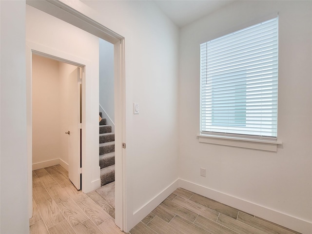 6735 Cohn St, Houston, TX 77091 - empty room with wood finish floors and stairs