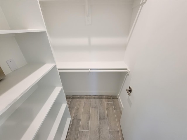 6735 Cohn St, Houston, TX 77091 - walk in closet with wood tiled floors