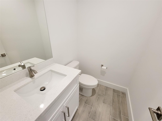6735 Cohn St, Houston, TX 77091 - bathroom featuring vanity and wood finish floors