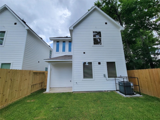 6735 Cohn St, Houston, TX 77091 - rear view of house with a fenced backyard