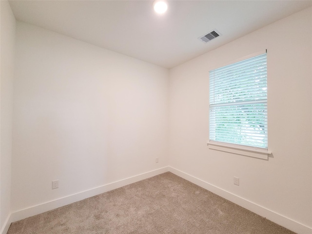 6735 Cohn St, Houston, TX 77091 - empty room featuring light colored carpet
