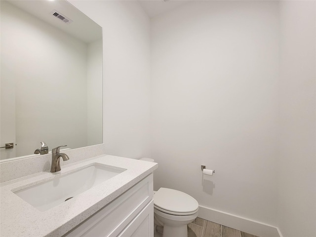 6735 Cohn St, Houston, TX 77091 - bathroom with vanity and wood finished floors