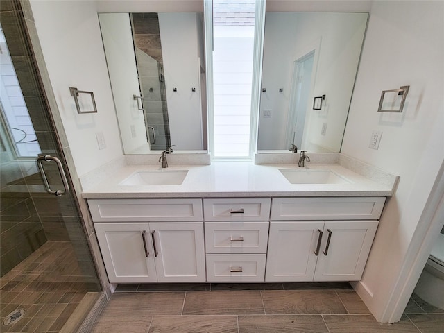 6735 Cohn St, Houston, TX 77091 - full bath featuring double vanity and a stall shower
