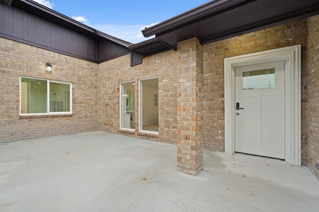 3351 S Sutton Sq, Stafford, TX 77477 - entrance to property with a patio area and brick siding