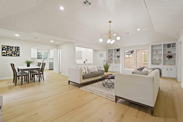 3351 S Sutton Sq, Stafford, TX 77477 - living area with lofted ceiling, a chandelier, built in features, light wood finished floors, and plenty of natural light