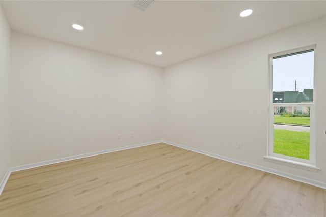 3351 S Sutton Sq, Stafford, TX 77477 - unfurnished room featuring light wood finished floors and recessed lighting