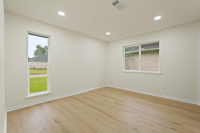 3351 S Sutton Sq, Stafford, TX 77477 - unfurnished room with light wood-type flooring and recessed lighting
