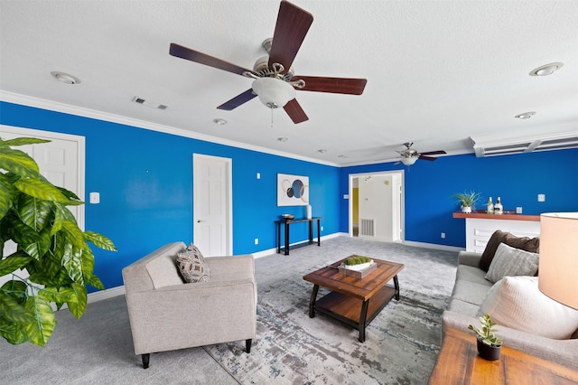 20234 Brondesbury Dr, Katy, TX 77450 - carpeted living area with a ceiling fan, crown molding, and a textured ceiling