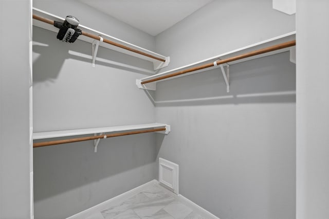 20234 Brondesbury Dr, Katy, TX 77450 - spacious closet with marble look tile flooring
