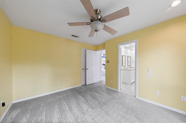 20234 Brondesbury Dr, Katy, TX 77450 - unfurnished bedroom with carpet floors, ensuite bathroom, and ceiling fan