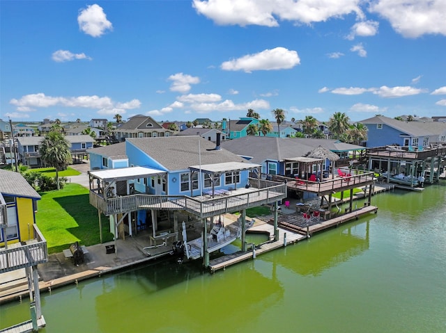 206 Galleon Dr, Freeport, TX 77541 - dock area with a residential view and a deck with water view