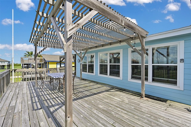 206 Galleon Dr, Freeport, TX 77541 - wooden deck with a pergola