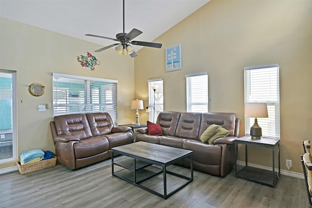 206 Galleon Dr, Freeport, TX 77541 - living room with high vaulted ceiling, ceiling fan, and wood finished floors