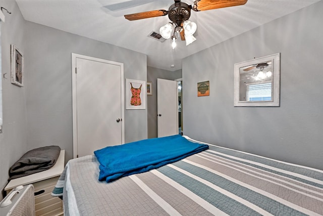 206 Galleon Dr, Freeport, TX 77541 - bedroom featuring a ceiling fan and a closet