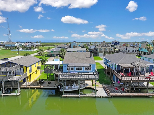 206 Galleon Dr, Freeport, TX 77541 - aerial view of residential area featuring a nearby body of water