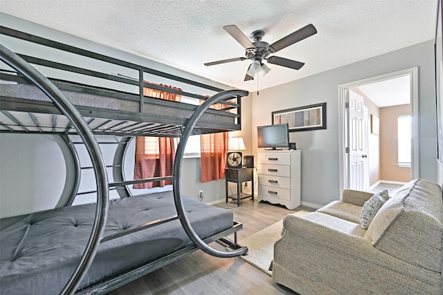 206 Galleon Dr, Freeport, TX 77541 - bedroom featuring wood finished floors and multiple windows