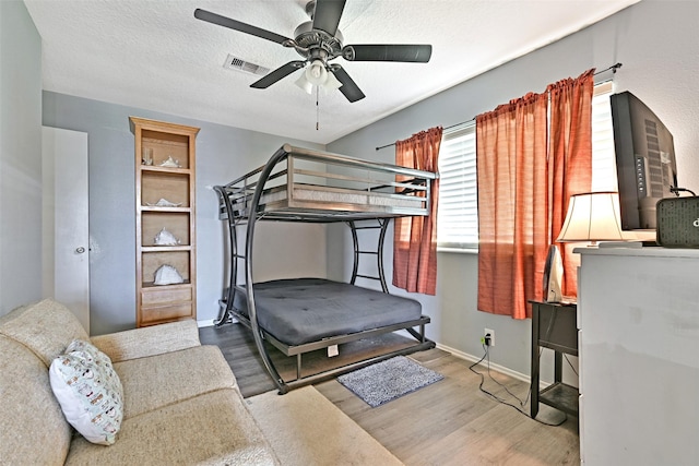 206 Galleon Dr, Freeport, TX 77541 - bedroom with wood finished floors and ceiling fan