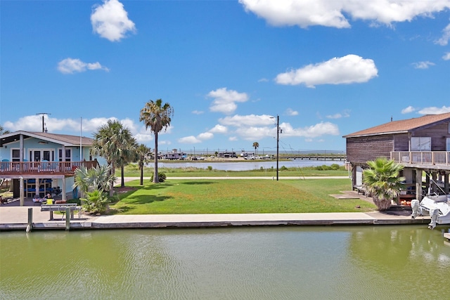 206 Galleon Dr, Freeport, TX 77541 - dock with a water view and a yard