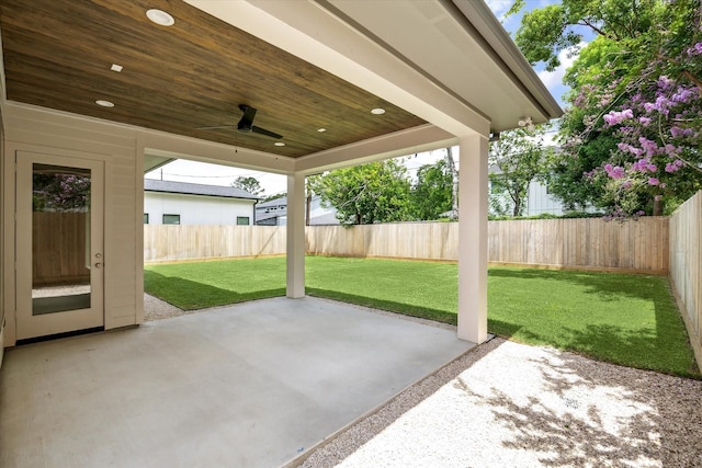2006 Chantilly Ln, Houston, TX 77018 - fenced backyard featuring a patio area and a ceiling fan