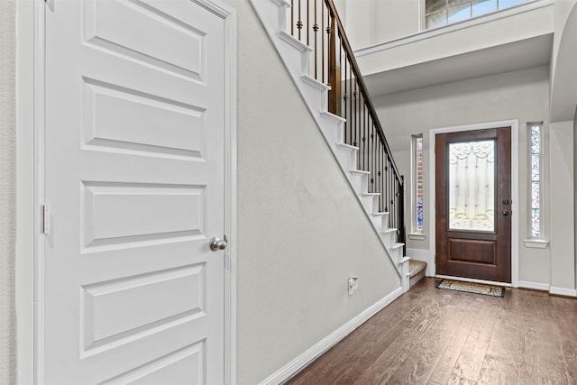 18514 Providence Landing Ln, Richmond, TX 77407 - foyer with wood finished floors and stairway