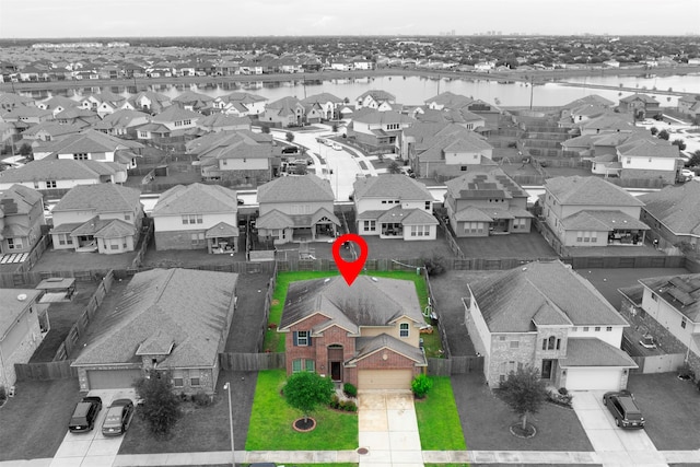 18514 Providence Landing Ln, Richmond, TX 77407 - aerial perspective of suburban area with a large body of water and property parcel outlined