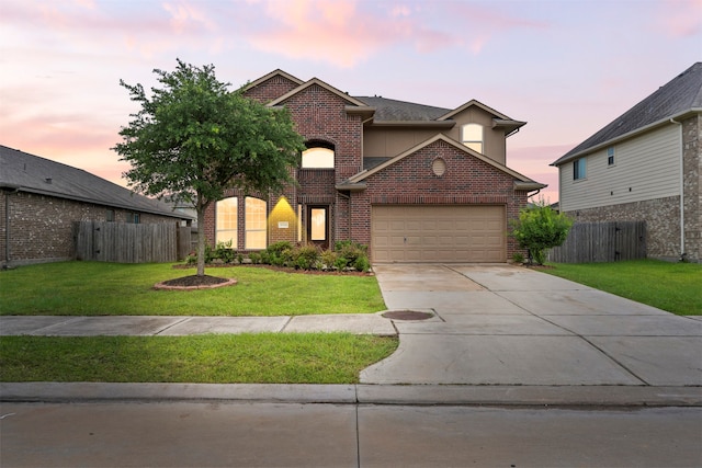 18514 Providence Landing Ln, Richmond, TX 77407 - view of front of home with brick siding, an attached garage, and driveway