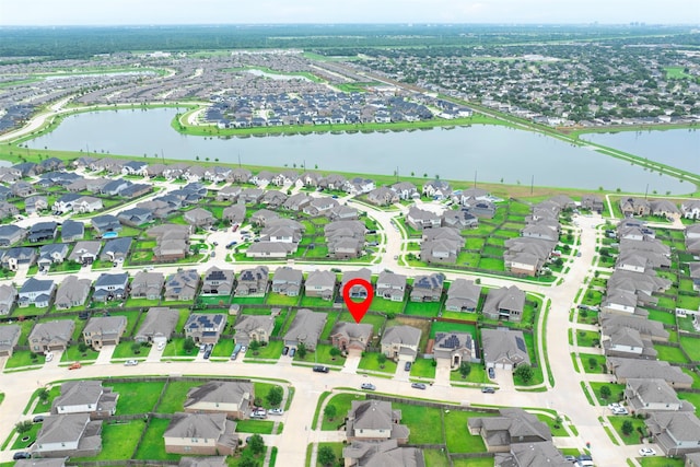 18514 Providence Landing Ln, Richmond, TX 77407 - aerial view of property and surrounding area featuring nearby suburban area and a large body of water