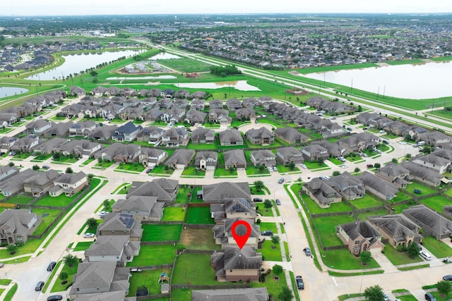18514 Providence Landing Ln, Richmond, TX 77407 - aerial view of property and surrounding area with a nearby body of water and nearby suburban area
