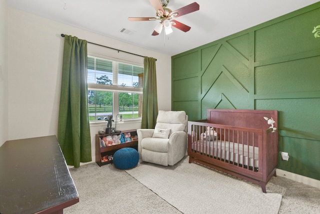 16003 Westward Ho St, Stagecoach, TX 77355 - carpeted bedroom with a nursery area and a ceiling fan