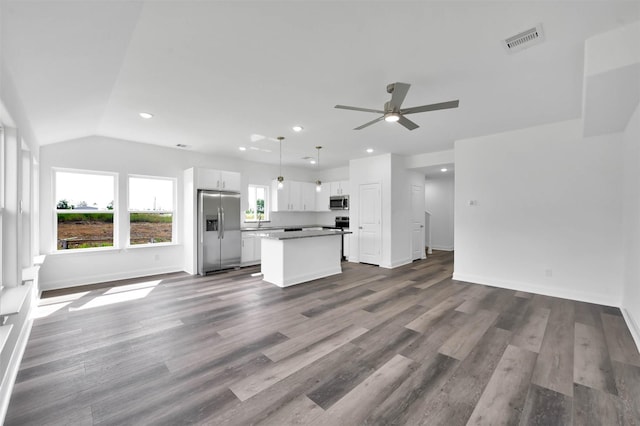 1089 Rd 5740, Cleveland, TX 77327 - unfurnished living room with ceiling fan, recessed lighting, dark wood finished floors, and vaulted ceiling
