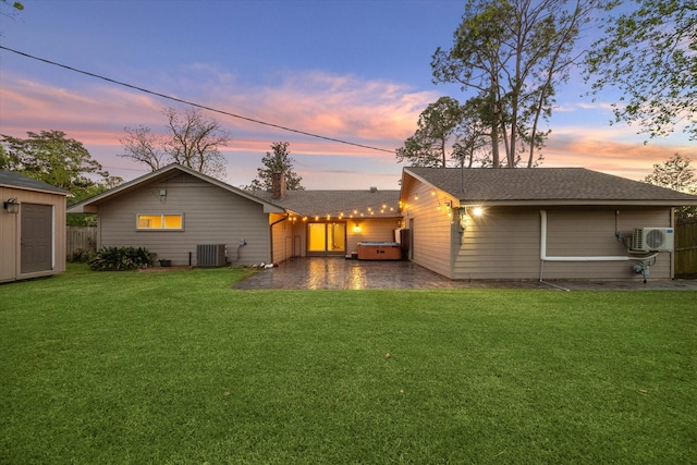 9222 Bronco Dr, Houston, TX 77055 - rear view of property with a patio, a shed, and roof with shingles