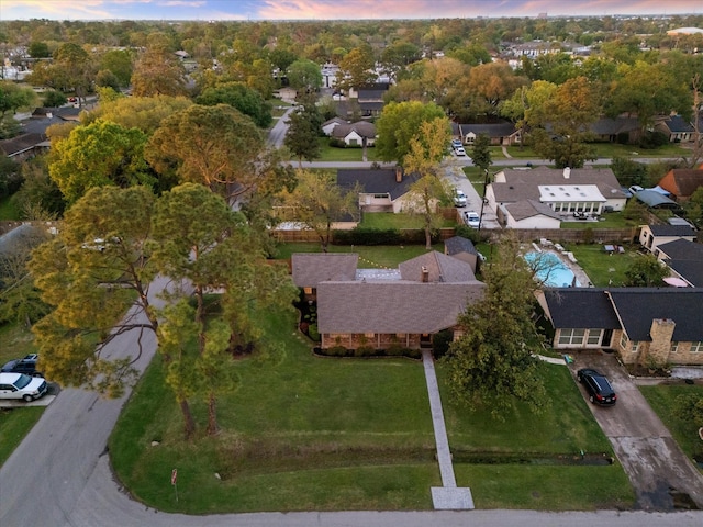 9222 Bronco Dr, Houston, TX 77055 - aerial view at dusk of view of pool and a residential view