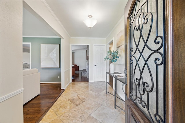 9222 Bronco Dr, Houston, TX 77055 - entryway featuring crown molding and baseboards