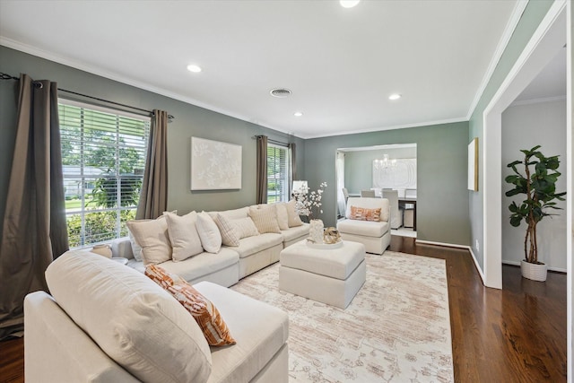 9222 Bronco Dr, Houston, TX 77055 - living area featuring crown molding, a chandelier, wood finished floors, and recessed lighting