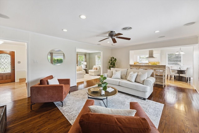 9222 Bronco Dr, Houston, TX 77055 - living area featuring a ceiling fan, crown molding, recessed lighting, and wood-type flooring