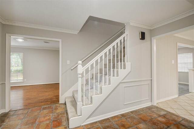 5330 Boyce Springs Dr, Houston, TX 77066 - stairs featuring crown molding and baseboards