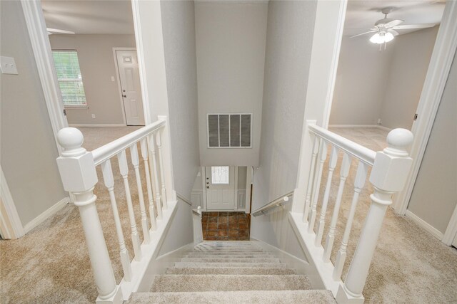 5330 Boyce Springs Dr, Houston, TX 77066 - stairway with carpet flooring and ceiling fan