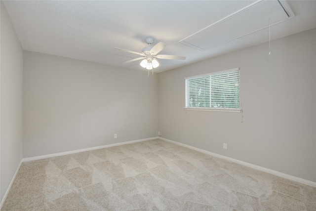 5330 Boyce Springs Dr, Houston, TX 77066 - spare room with attic access, carpet, and a ceiling fan