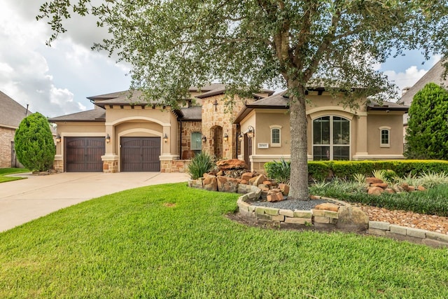 20307 Knights Branch Dr, Cypress, TX 77433 - mediterranean / spanish home featuring driveway, stone siding, and stucco siding