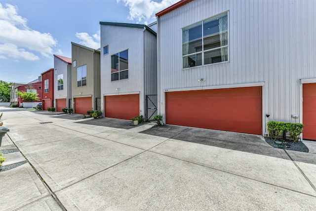 3028 Commerce St, Houston, TX 77003 - view of front facade featuring an attached garage and concrete driveway