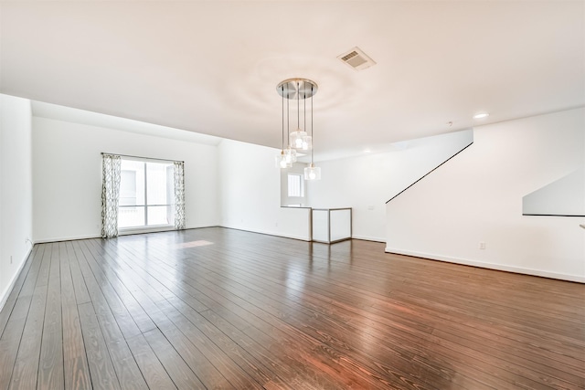 3028 Commerce St, Houston, TX 77003 - empty room with dark wood-type flooring and baseboards