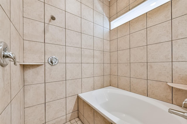 3028 Commerce St, Houston, TX 77003 - full bath with a tub to relax in, tile walls, and tiled shower