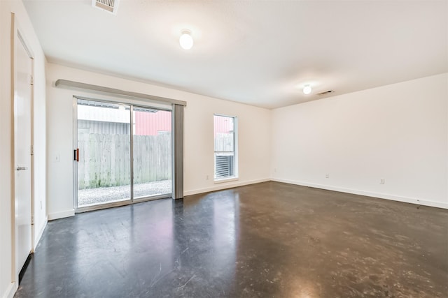3028 Commerce St, Houston, TX 77003 - empty room with finished concrete flooring and baseboards