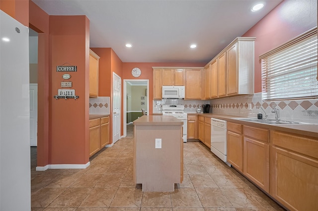 24922 Falcon Hollow Ln, Katy, TX 77494 - kitchen featuring white appliances, light countertops, backsplash, a kitchen island, and recessed lighting