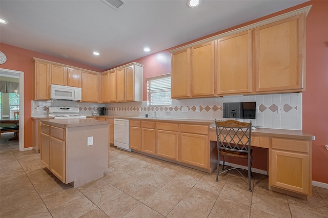 24922 Falcon Hollow Ln, Katy, TX 77494 - kitchen with white appliances, light brown cabinetry, backsplash, and recessed lighting